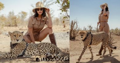 Miss Universe Strikes a Pose with a Cheetah