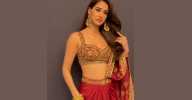 Disha Patani Stuns in Regal Red and Gold Ensemble for Festive Season