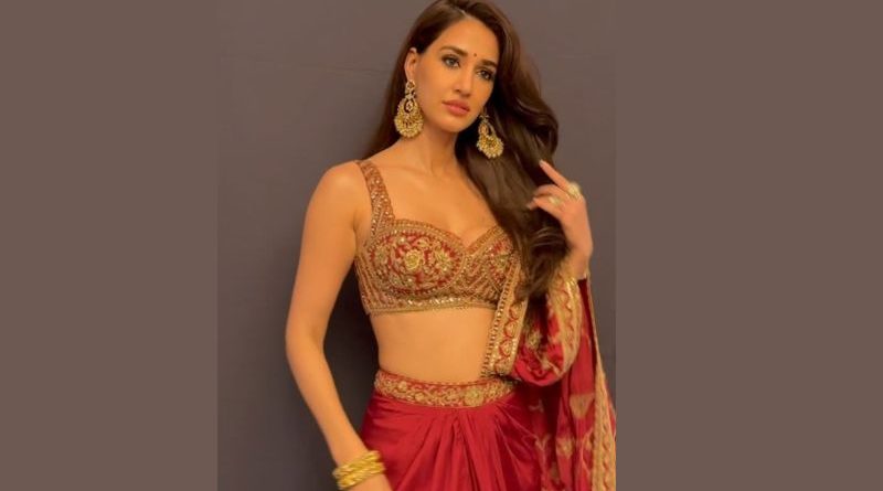 Disha Patani Stuns in Regal Red and Gold Ensemble for Festive Season