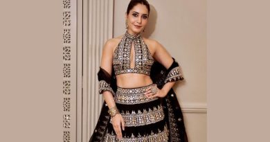 Raashii Khanna Stuns in Regal Black and Gold Lehenga